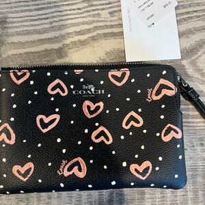 Coach pink crayon heart print wristlet